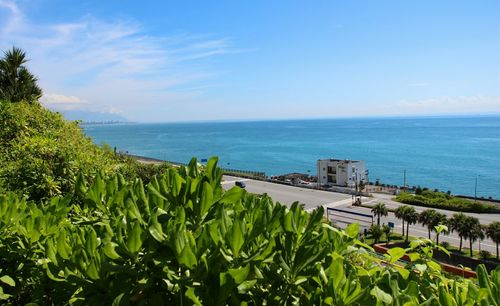 Scenic view of sea against blue sky