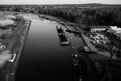 High angle view of dam by river against sky