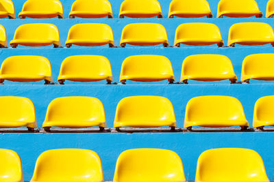 Full frame shot of chairs at stadium