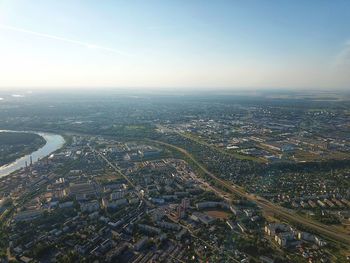 Aerial view of city and buildings against sky