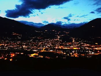 Illuminated cityscape at night