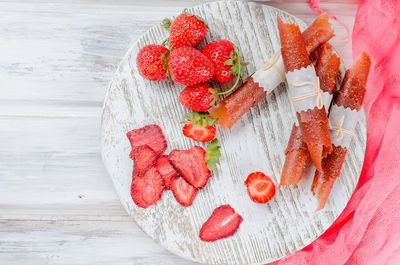 High angle view of chopped fruits on table