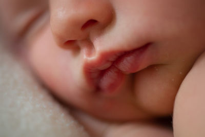 Close up and details of newborn mouth and lips