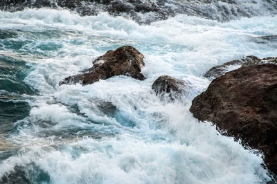 Scenic view of rocks in sea