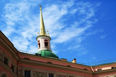 Low angle view of built structure against blue sky