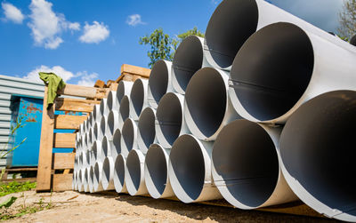 Downpipe warehouse. steel pipes, parts for the construction of a roof drainage system in a warehouse