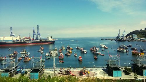 View of boats in calm sea against the sky