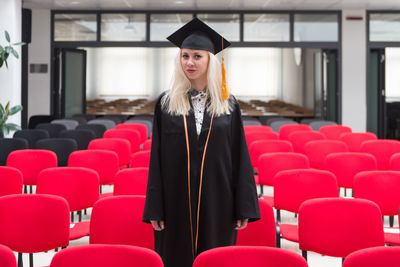 Rear view of woman in graduation