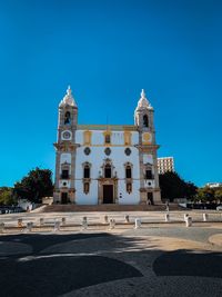 View of historical building against blue sky