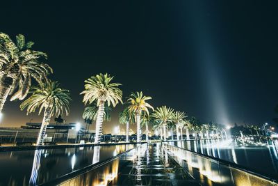 Reflection of illuminated buildings in water