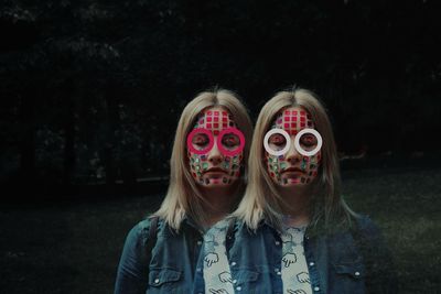 Multiple image of woman with decorations on face