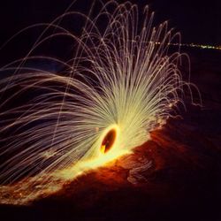 Firework display at night