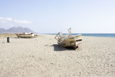 Abandoned boats on the beach of cabo de gata, almeria