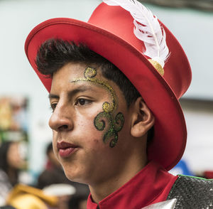 Close-up portrait of boy looking away