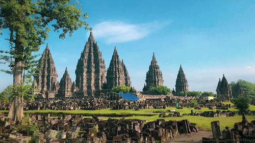 Panoramic view of temple against building