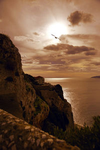 Scenic view of sea at sunset