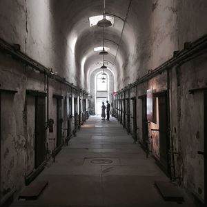 People walking in tunnel