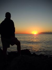 Scenic view of sea at sunset