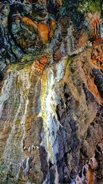 Close-up of rock formation in water