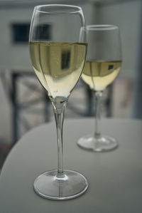 Close-up of wine in glass on table