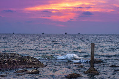 Scenic view of sea against sky during sunset