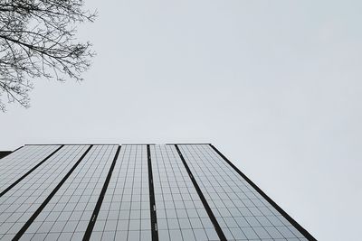 Low angle view of skyscraper against clear sky
