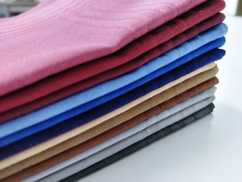 Stack of colorful sweaters