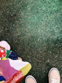 Low section of person standing on ground