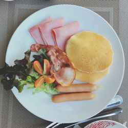 Close-up of breakfast served on plate