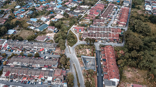 High angle view of street amidst buildings in city