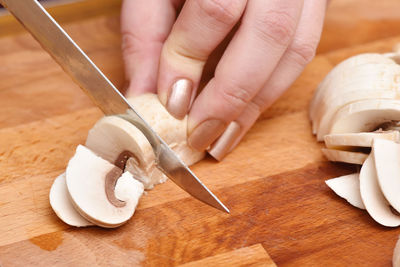 Close-up of hand holding ice cream