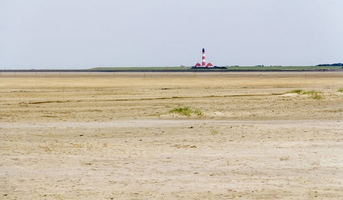 Scenic view of land against clear sky