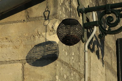 Close-up of clothes hanging on shadow