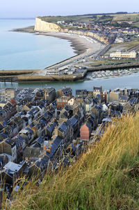 High angle view of sea shore against sky