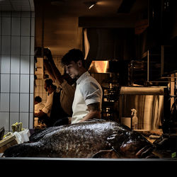 Young man preparing food