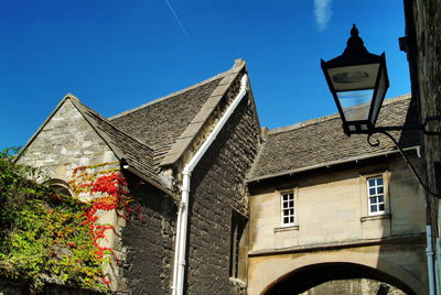 Low angle view of building against clear blue sky