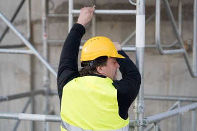 Construction worker on scaffolding