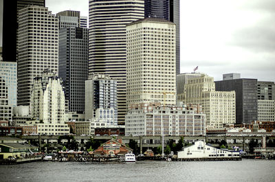 Buildings in city against sky