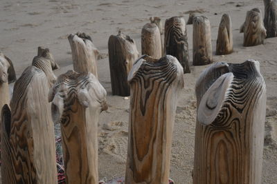 High angle view of statues on beach