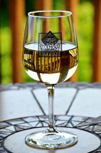 Close-up of wine in glass on table