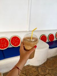 Close-up of hand holding ice cream