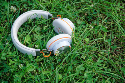 Headphone on green grass in park