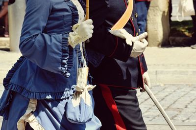 Midsection of man standing on floor