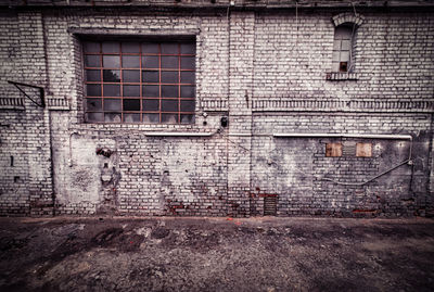 Graffiti on wall of old building