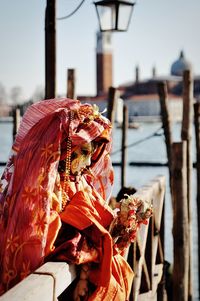 Close-up of person wearing carnival costume