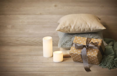 Close-up of candles on table