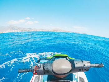 Scenic view of sea against blue sky