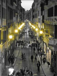 People on city street at night