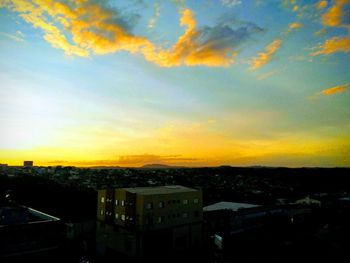 High angle view of townscape against sky at sunset