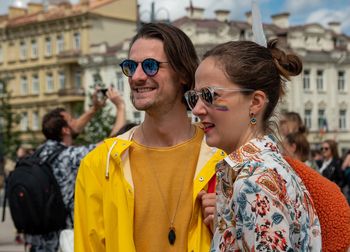 Portrait of smiling woman wearing sunglasses